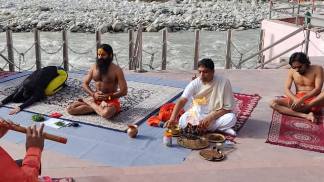 Baba Ramdev did yoga in Ganga Ghat of Gangotri Dham,